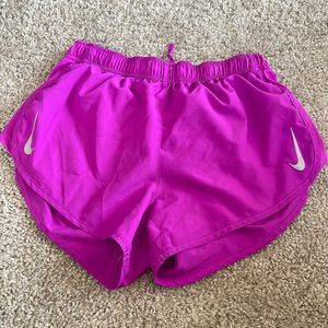Purple nike shorts that are great for running or playing soccer.